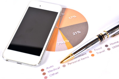 Budgeting tools: pen, paper, printable sheet.