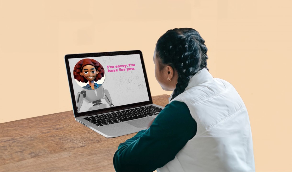 Girl looking at digital person on computer