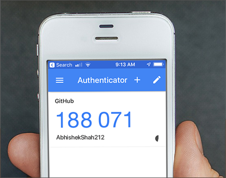 Photo of a hand holding a phone with an app open. The app is titled "Authenticator" and shows the code "188 071" labeled as "Github".