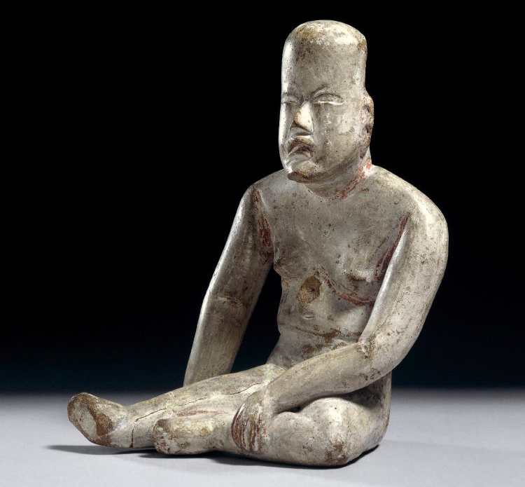 Seated pottery figure, 1200 BC - 400 B.C.E., Olmec, pottery, 15.5 x 11.5 cm © The Trustees of the British Museum
