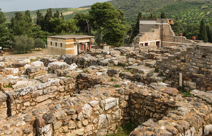 The archaeological site at Knossos, with restored rooms in the background, Crete
