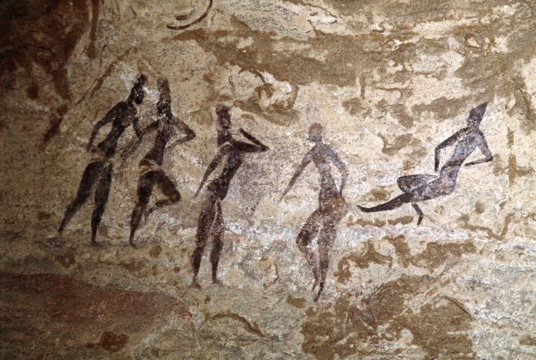 Painted rock art depicting five red figures, from Jabbaren, Ajjer Plateau, Djanet, Tassili, Algeria. 2013,2034.4248 © TARA/David Coulson