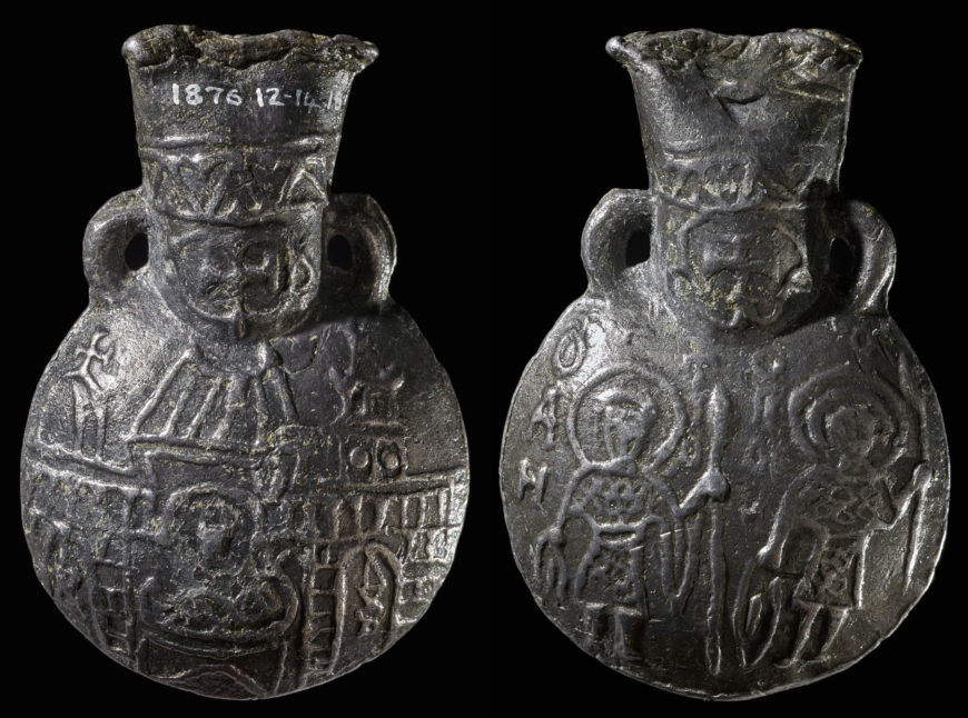 Pilgrimage ampulla from Jerusalem with depictions of the Church of the Holy Sepulcher (front) and two warrior saints (reverse), 12–13th century, lead, made in Jerusalem, 56.6 x 37 mm (© Trustees of the British Museum)
